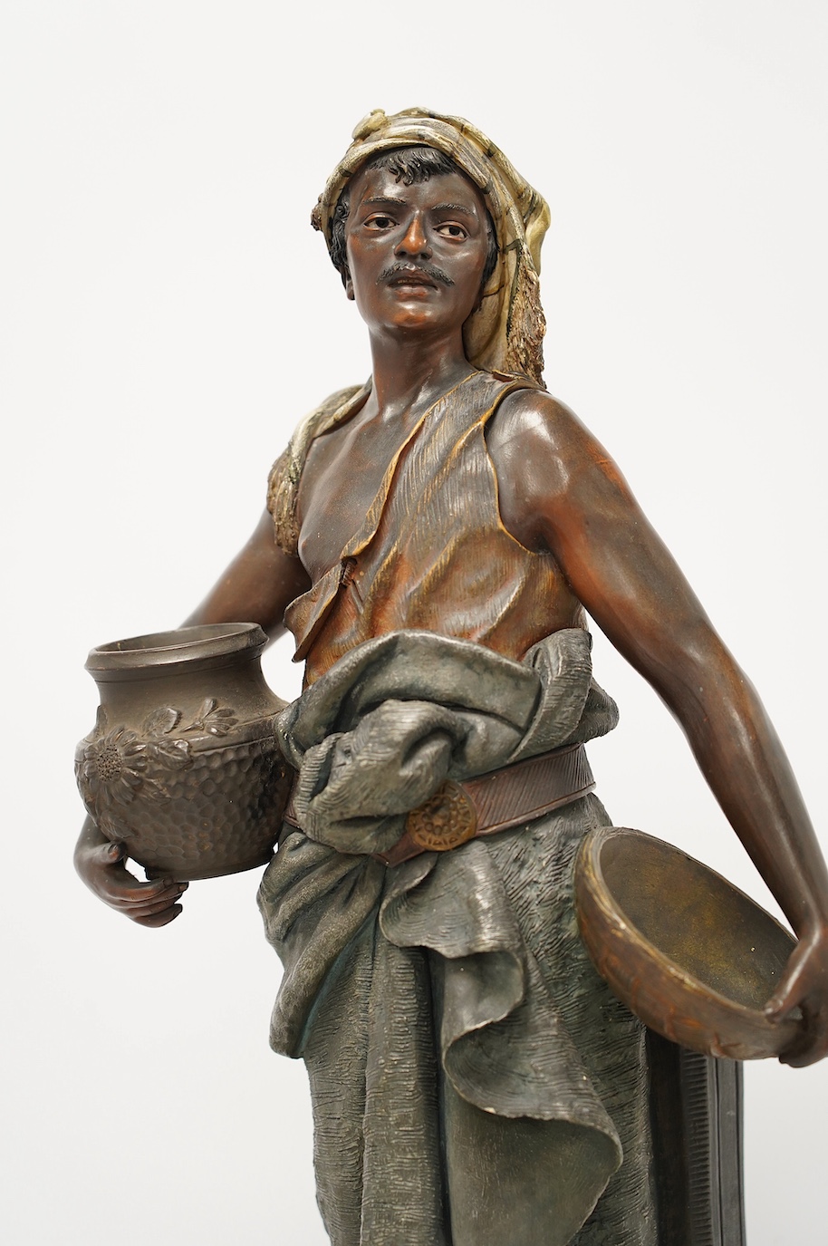 A large Austrian cold painted terracotta figure of a street seller, 59cm high. Condition - fair to good, minor chips